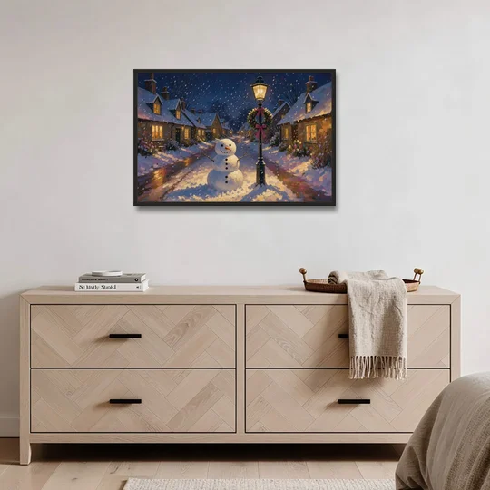 Snowman by the Wreathed Village Lamppost - Black Framed Canvas Wall Art - Coffee Table - 36x24