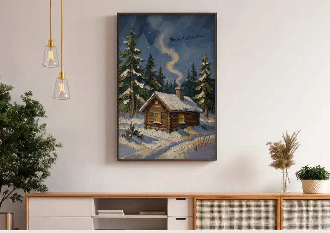 Snowy Cabin Painting Under the Passing Sleigh canvas wall art above a wooden sideboard under pendant lights