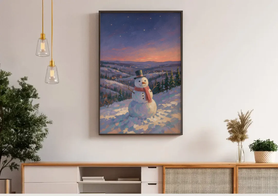 Snowy Night Painting with a Hilltop Snowman canvas wall art above a wooden sideboard under pendant lights