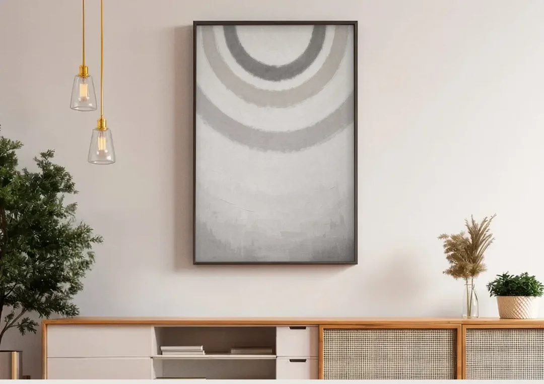 Soft Abstract Painting of Three Grey Ripples canvas wall art above a wooden sideboard under pendant lights