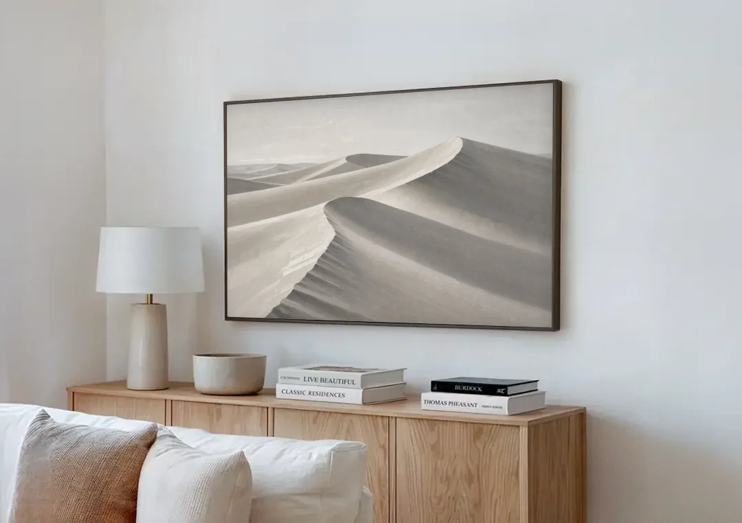 Sophisticated Dune Crests in Ivory and Charcoal canvas wall art above a wooden sideboard next to a sofa