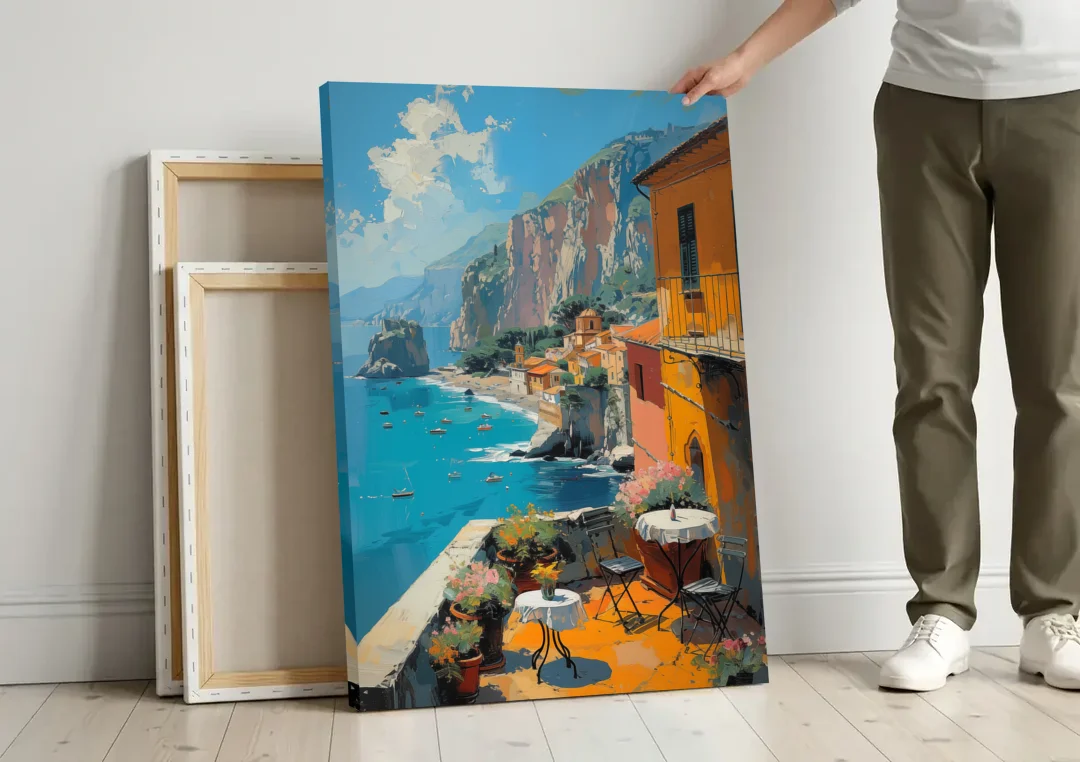 Sorrento Wall Art of a Cliff Terrace canvas wall art leaning against a wall next to blank canvases
