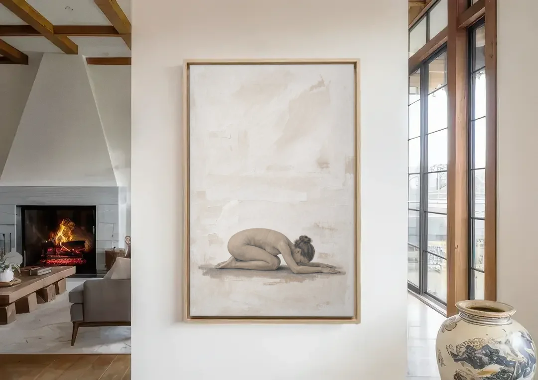 Spa Room Decor with Child's Pose in Sand canvas wall art in a living room with a fireplace
