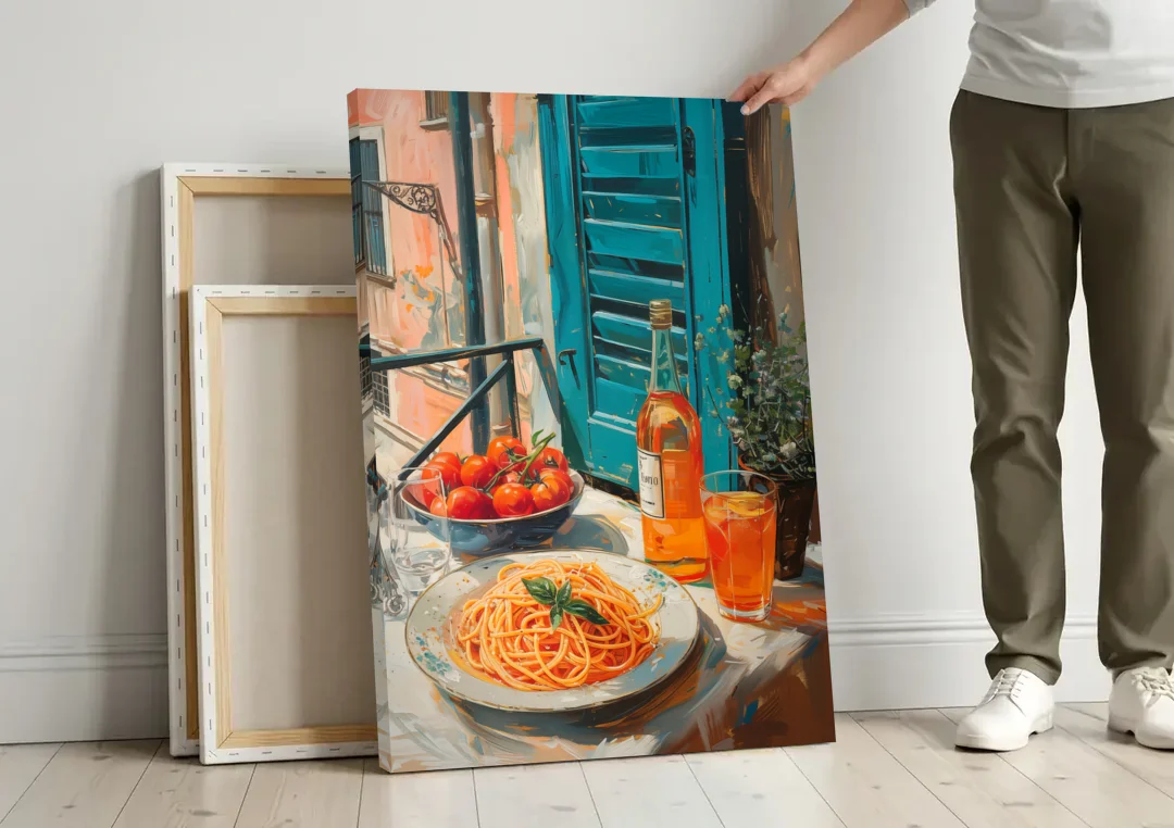 Spaghetti Art with Tomatoes and Wine canvas wall art leaning against a wall next to blank canvases