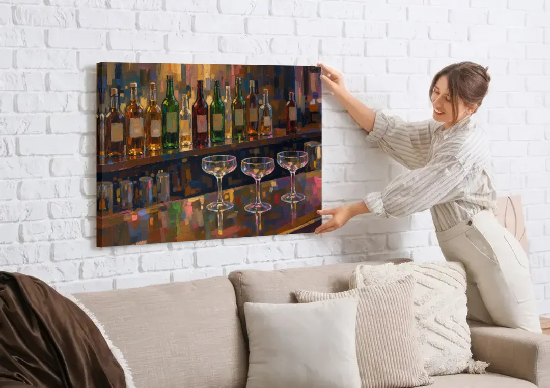 Speakeasy Decor Back Bar with Three Coupes canvas wall art being hung on a white brick wall above a sofa
