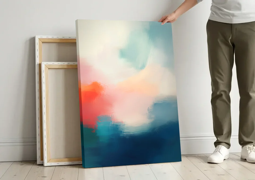 Spectrum Sea canvas wall art leaning against a wall next to blank canvases