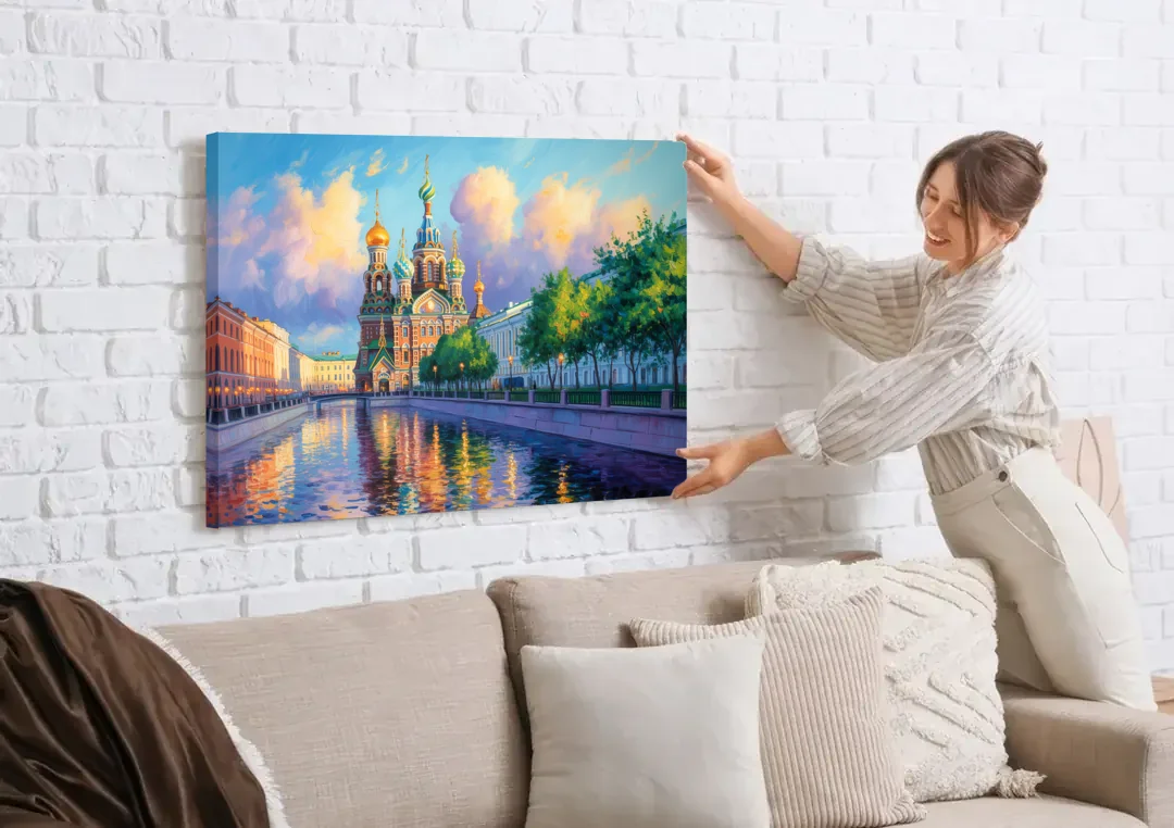 Spilled Blood Splendor canvas wall art being hung on a white brick wall above a sofa