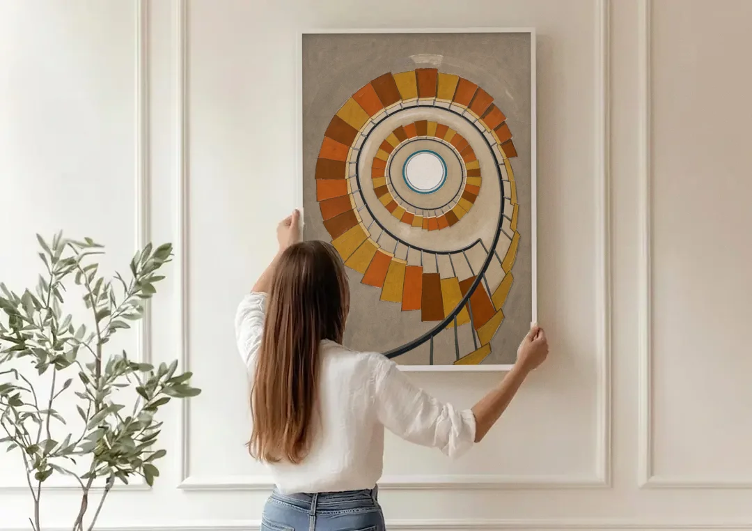 Spiral Staircase Art Rising to a Round Skylight canvas wall art being hung on a paneled wall