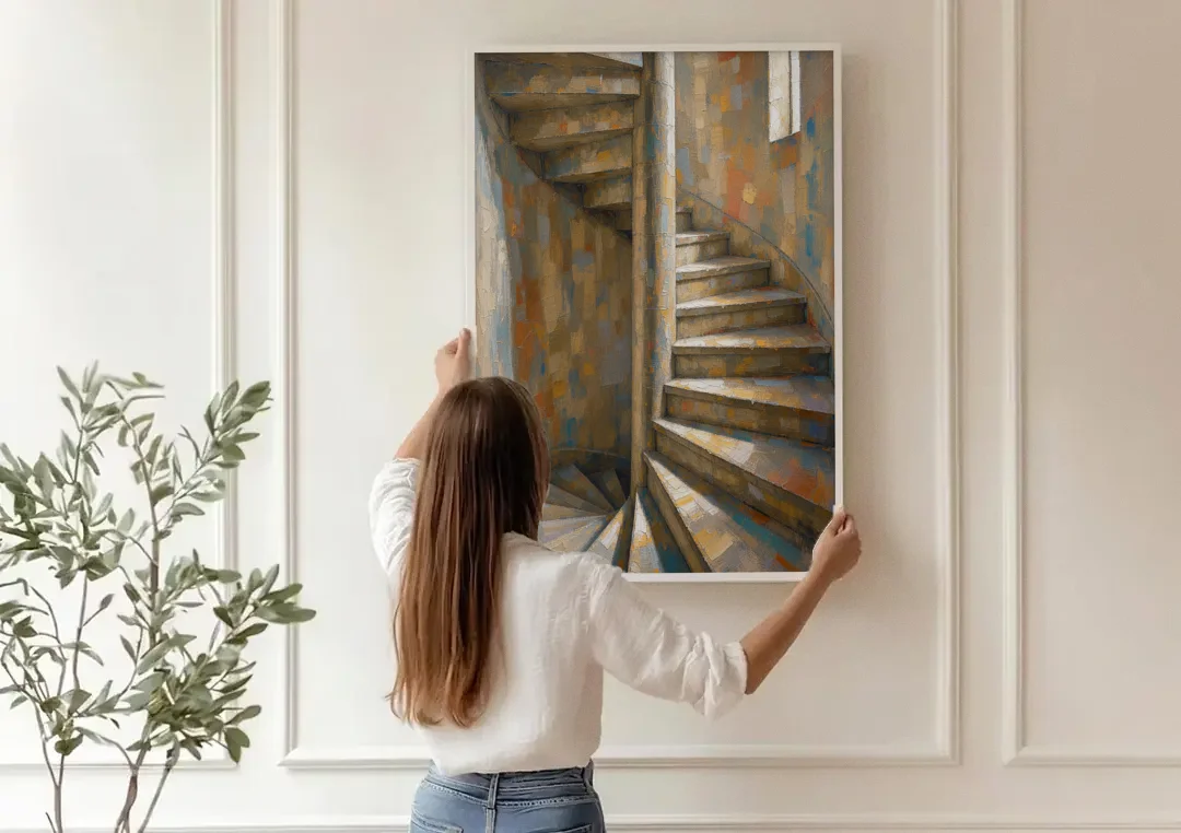 Spiral Staircase Painting in a Stone Tower canvas wall art being hung on a paneled wall