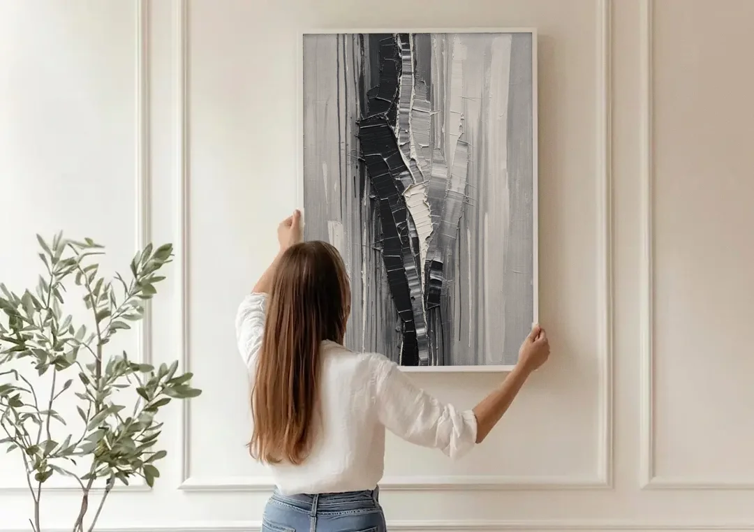 Split Black Column for a Men's Office canvas wall art being hung on a paneled wall