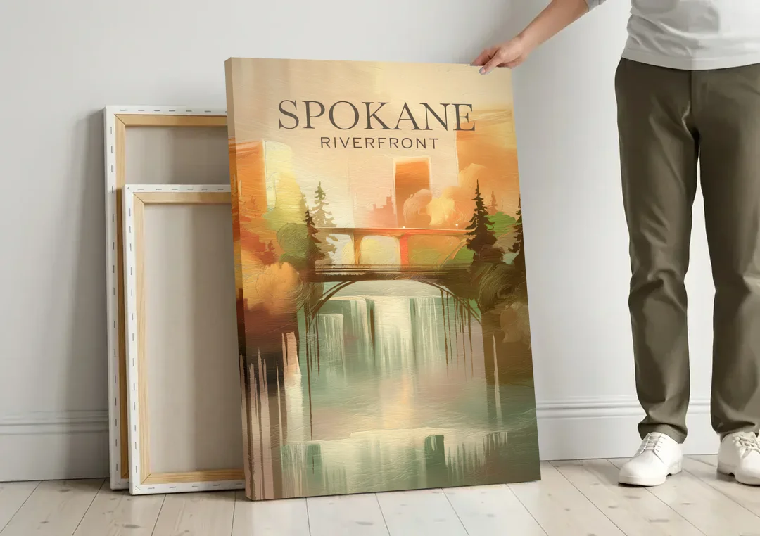 Spokane Riverfront Views canvas wall art leaning against a wall next to blank canvases