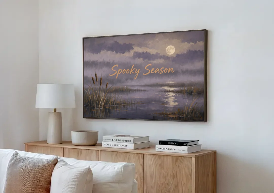 Spooky Halloween Canvas of a Moonlit Marsh canvas wall art above a wooden sideboard next to a sofa