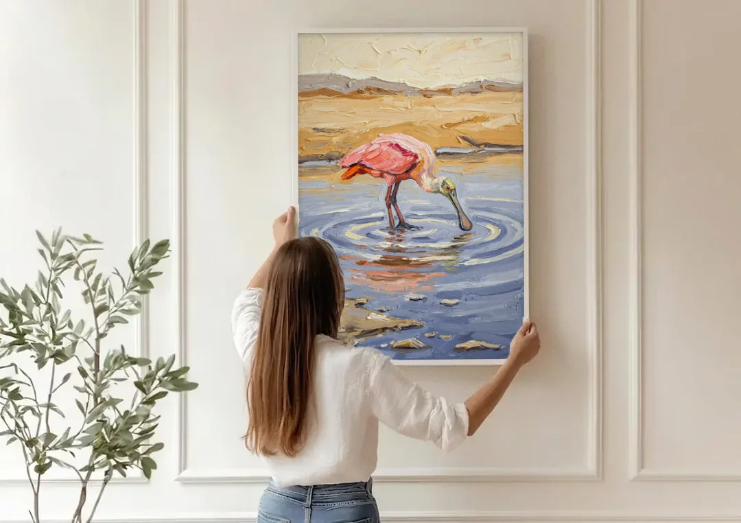 Spoonbill Painting in Golden Shallows canvas wall art being hung on a paneled wall