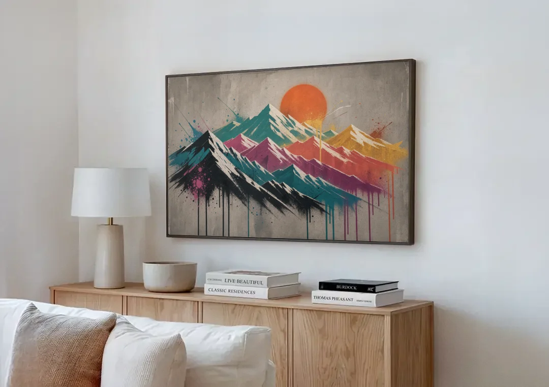 Street Art Spray Stencil Mountain Range Under Orange Sun canvas wall art above a wooden sideboard next to a sofa