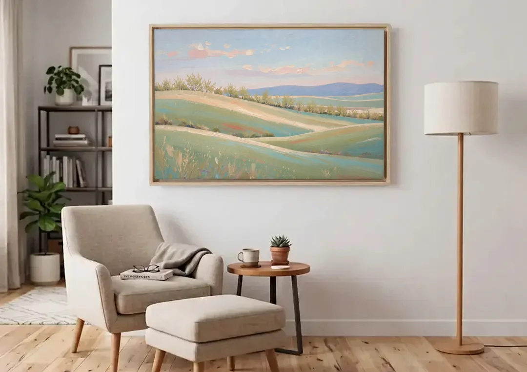Spring Hills Under a Blush Morning for the Guest Bedroom canvas wall art above an armchair in a bright living room