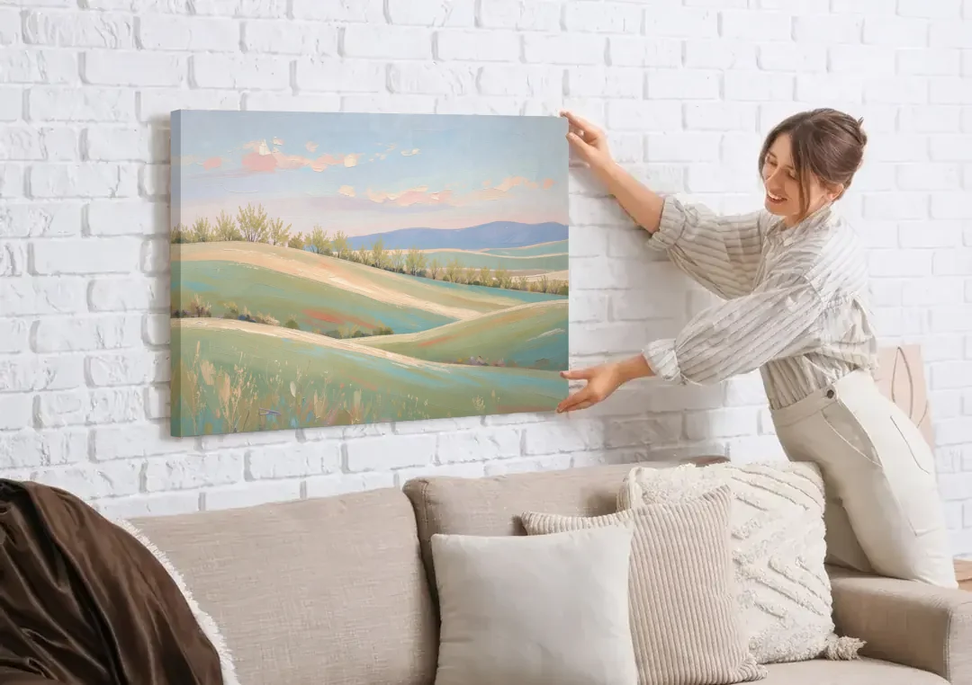 Spring Hills Under a Blush Morning for the Guest Bedroom canvas wall art being hung on a white brick wall above a sofa