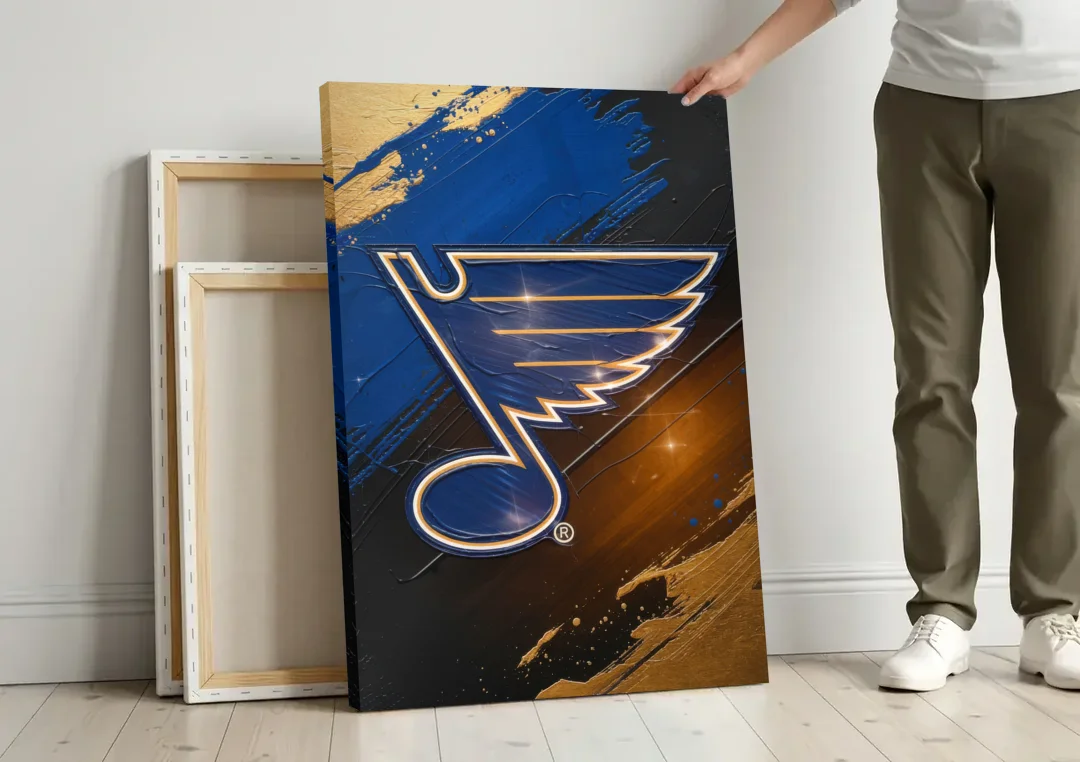 St. Louis Blues Hockey Theme canvas wall art leaning against a wall next to blank canvases