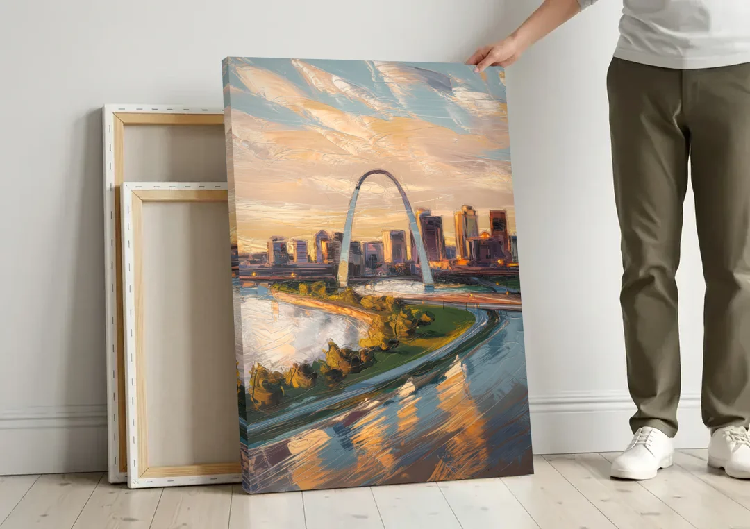 St. Louis Downtown Aerial View canvas wall art leaning against a wall next to blank canvases