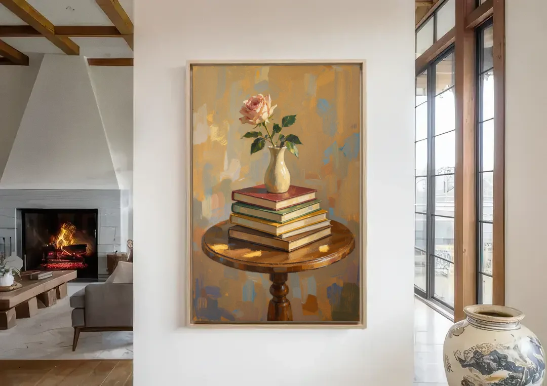 Stack of Books Painting with a Blush Rose canvas wall art in a living room with a fireplace