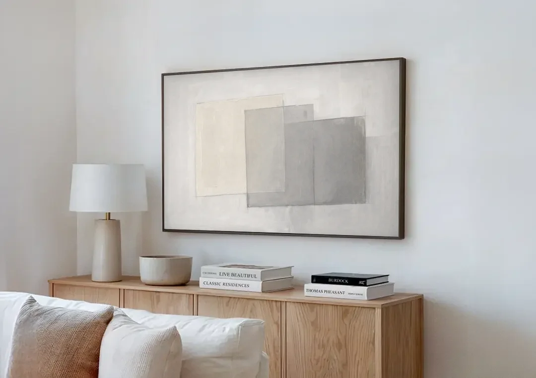 Neutral Abstract Stacked Tissue Panels canvas wall art above a wooden sideboard next to a sofa