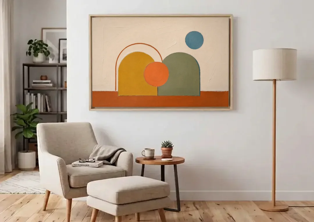 Staircase Wall Decor Ideas with Mustard and Sage Arches canvas wall art above an armchair in a bright living room