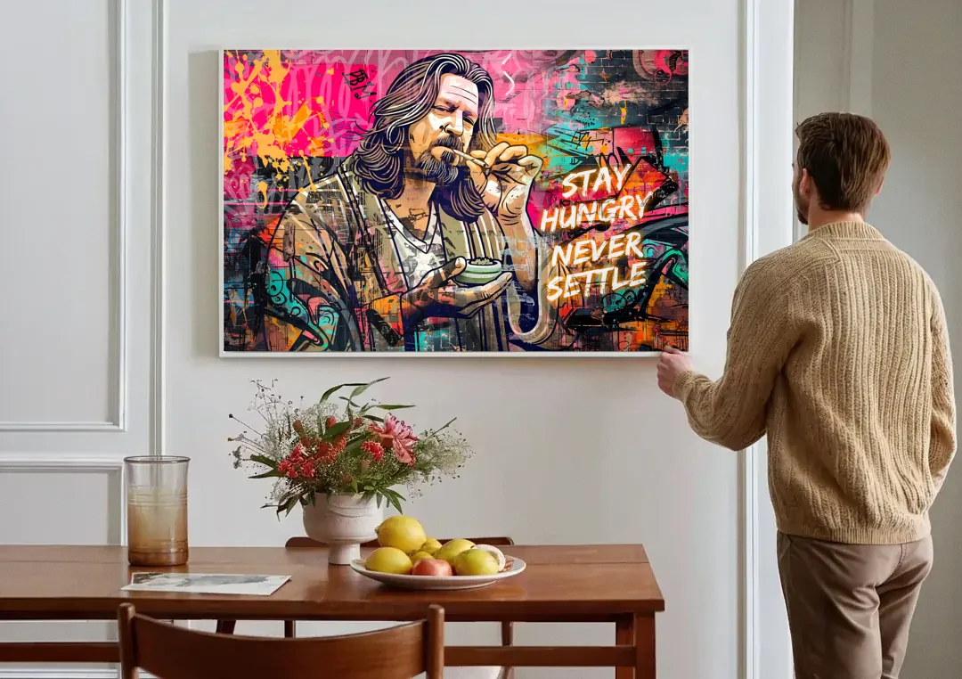 Stay Hungry Never Settle canvas wall art above a dining table