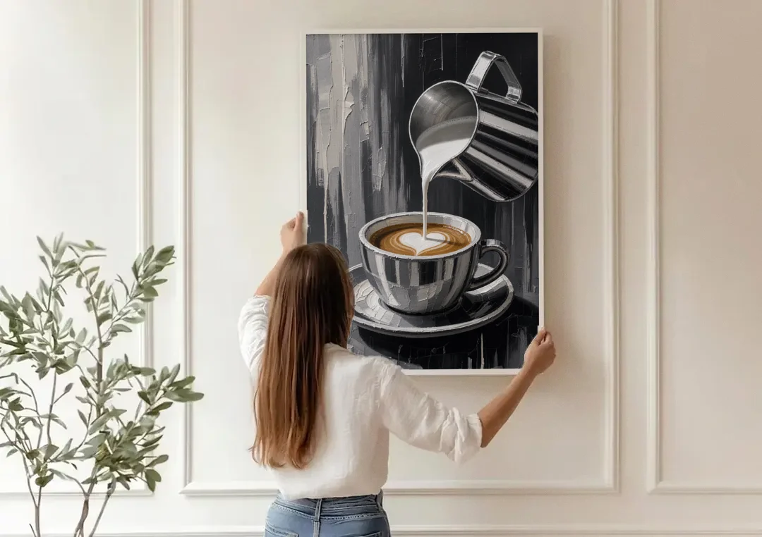 Steamed Milk Heart Pour for the Coffee Station canvas wall art being hung on a paneled wall
