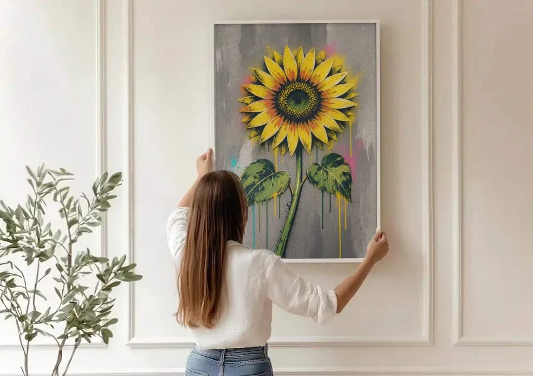 Street Art Stenciled Yellow Sunflower on Concrete canvas wall art being hung on a paneled wall