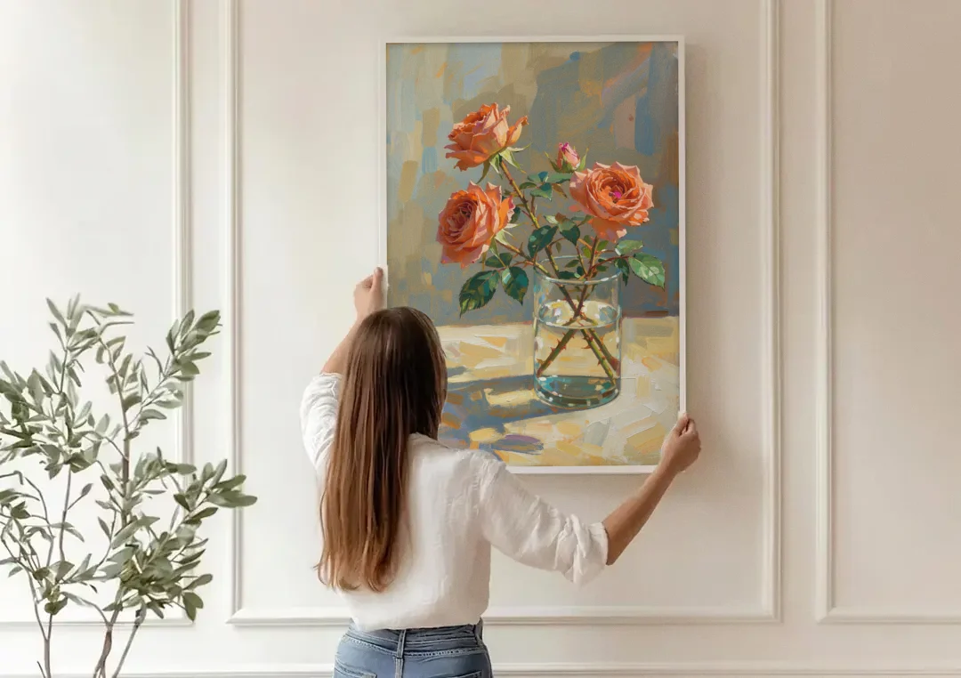 Still Life Flower Painting with Coral Roses canvas wall art being hung on a paneled wall