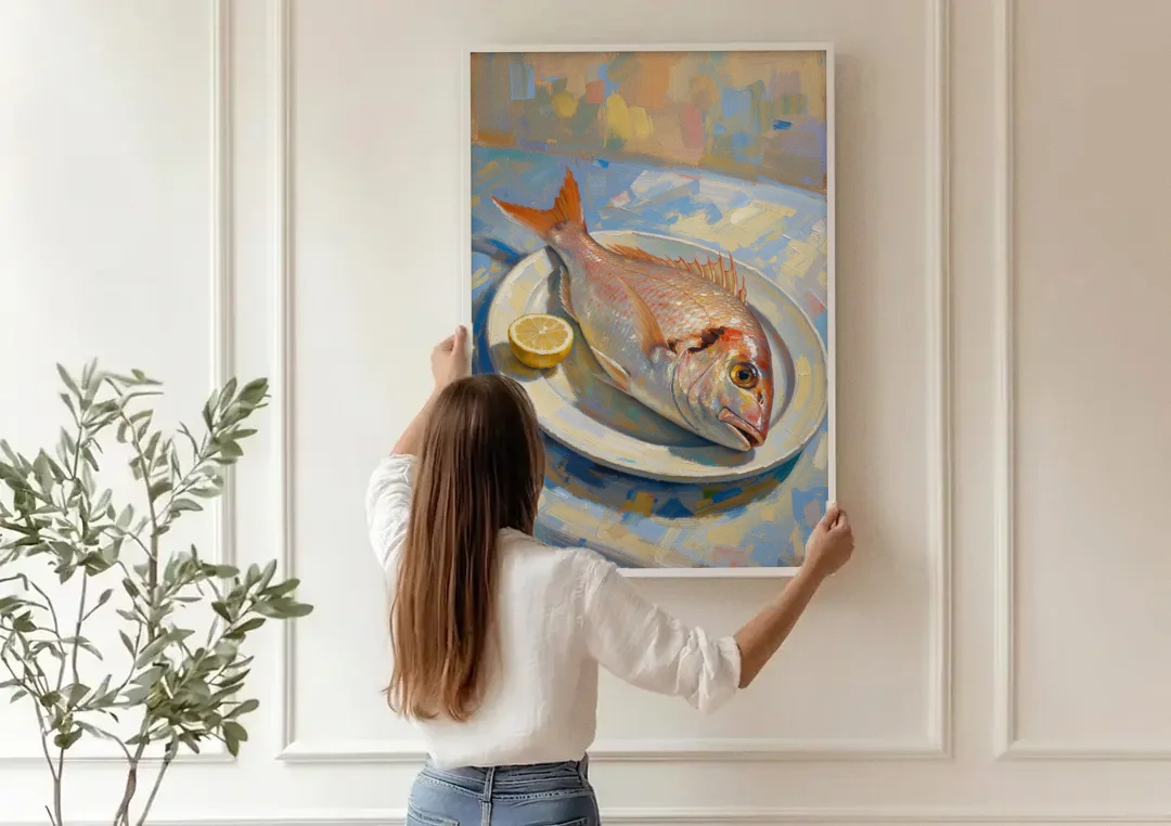 Still Life Oil Painting of Red Snapper and Lemon canvas wall art being hung on a paneled wall