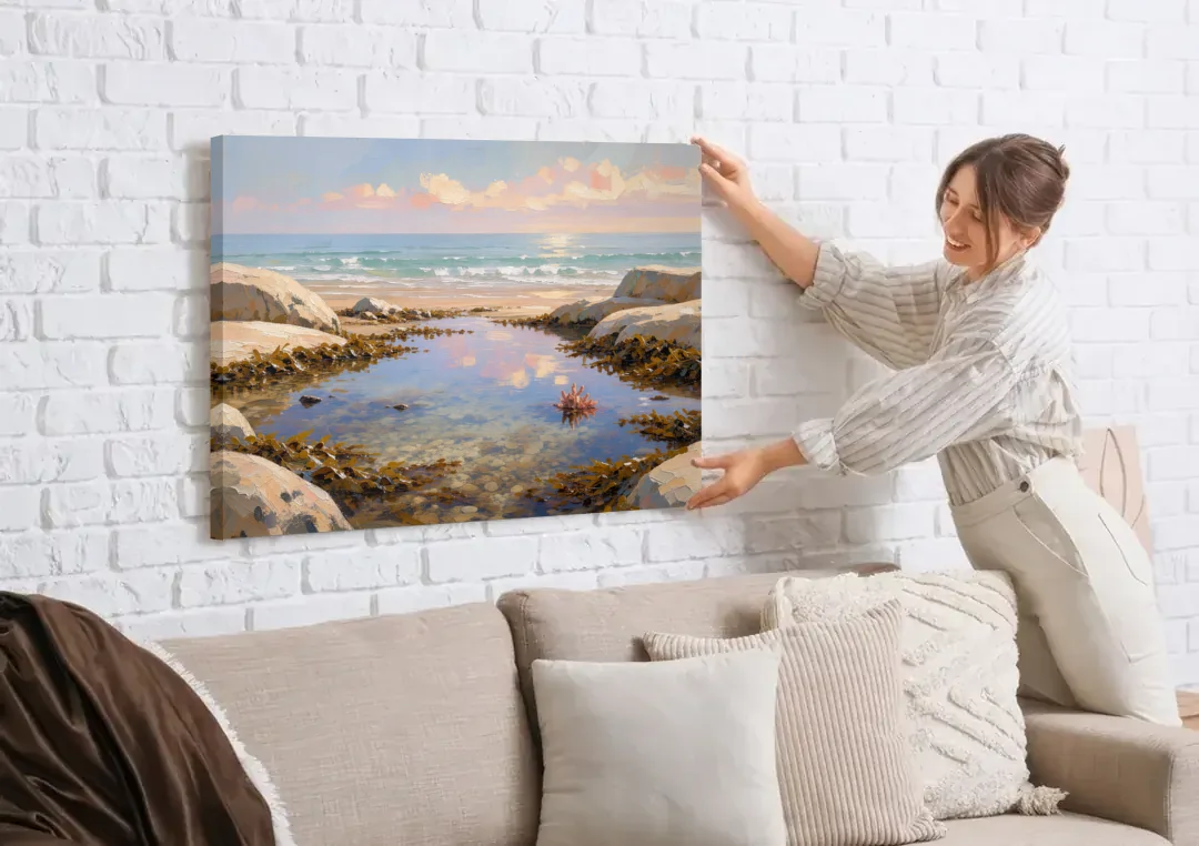 Still Tide Pool Reflection for the Beach House canvas wall art being hung on a white brick wall above a sofa