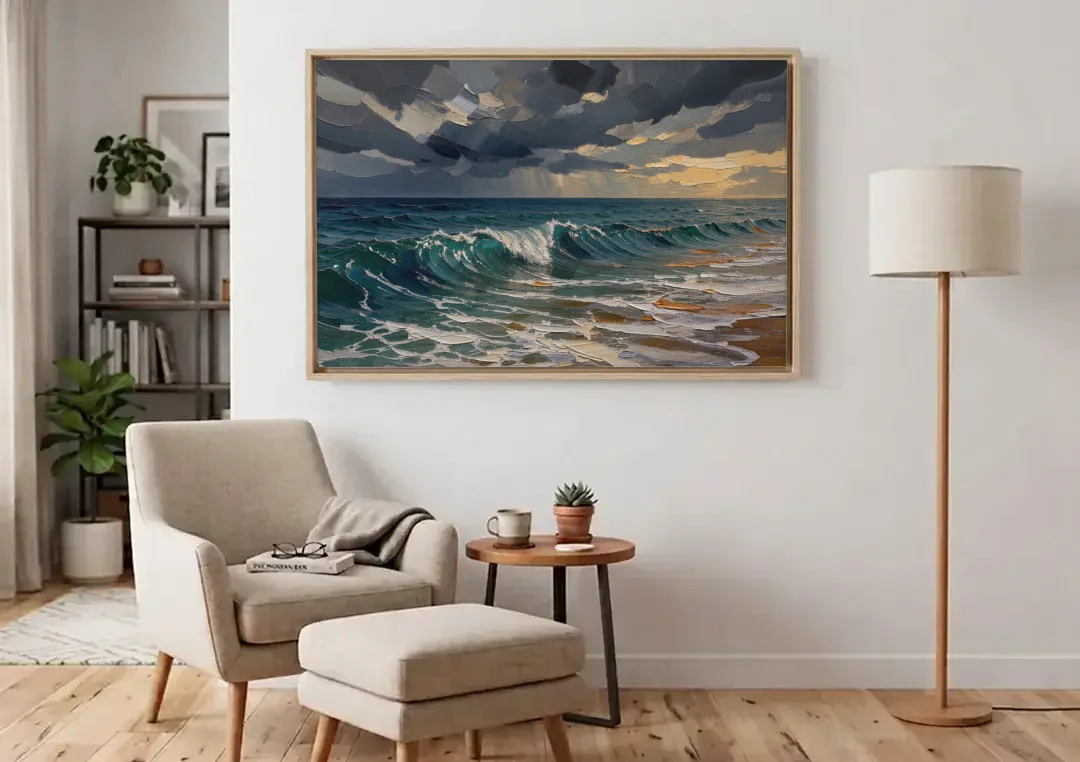 Stormy Sea Painting with Breaking Wave canvas wall art above an armchair in a bright living room