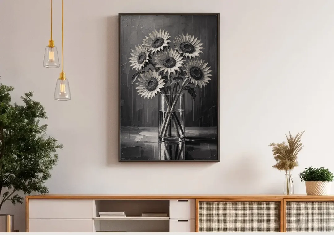Black and White Sunflower Bouquet in a Glass Vase canvas wall art above a wooden sideboard under pendant lights