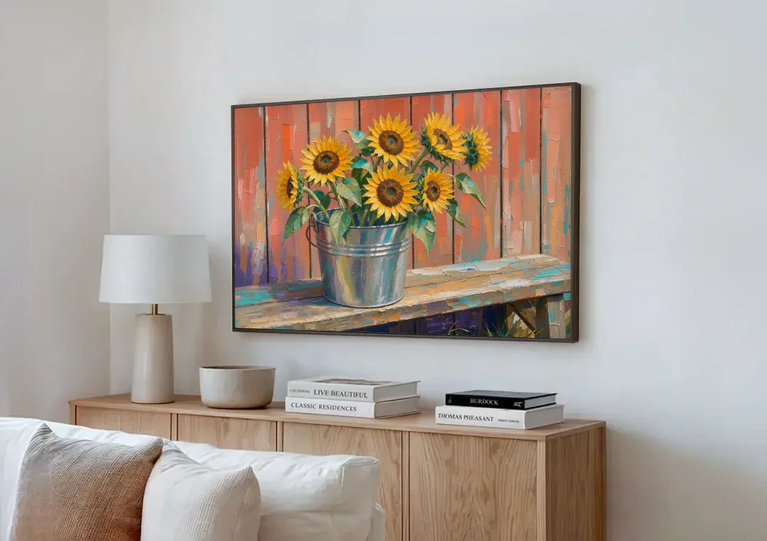 Rustic Sunflowers in a Tin Bucket canvas wall art above a wooden sideboard next to a sofa
