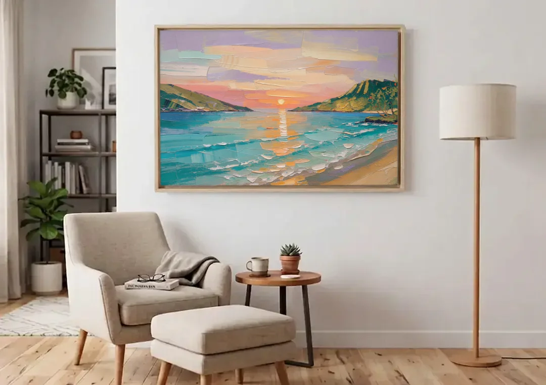 Sunrise Bay Between Sage Green Headlands canvas wall art above an armchair in a bright living room