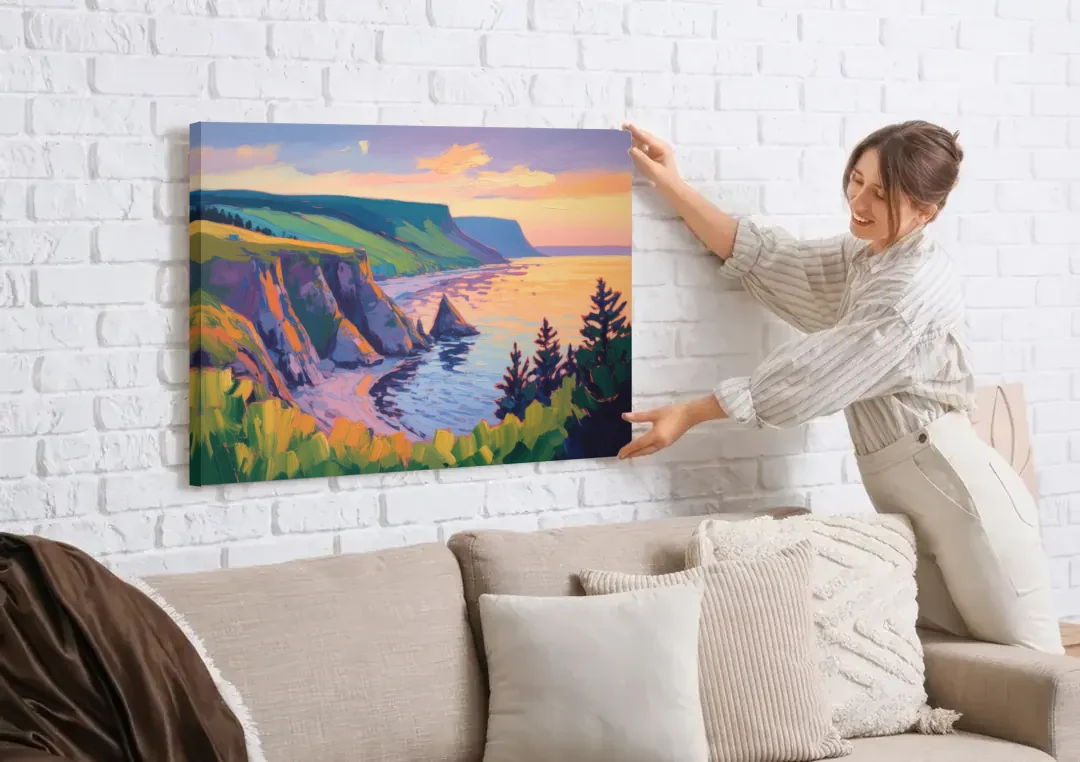 Sunset Over Cape Breton canvas wall art being hung on a white brick wall above a sofa