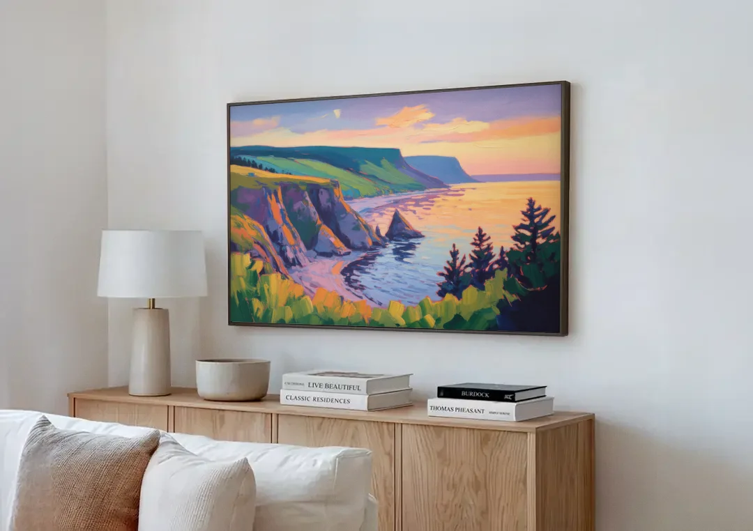 Sunset Over Cape Breton canvas wall art above a wooden sideboard next to a sofa