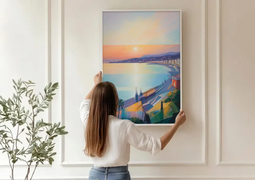 Sunset Over Nice canvas wall art being hung on a paneled wall