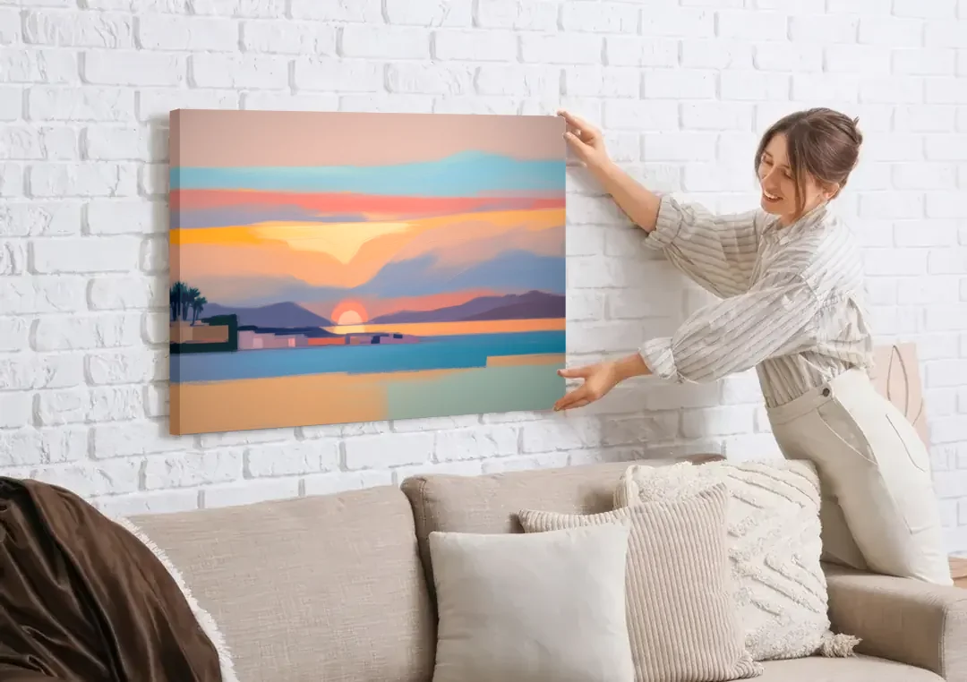 Sunset over Palma Bay canvas wall art being hung on a white brick wall above a sofa