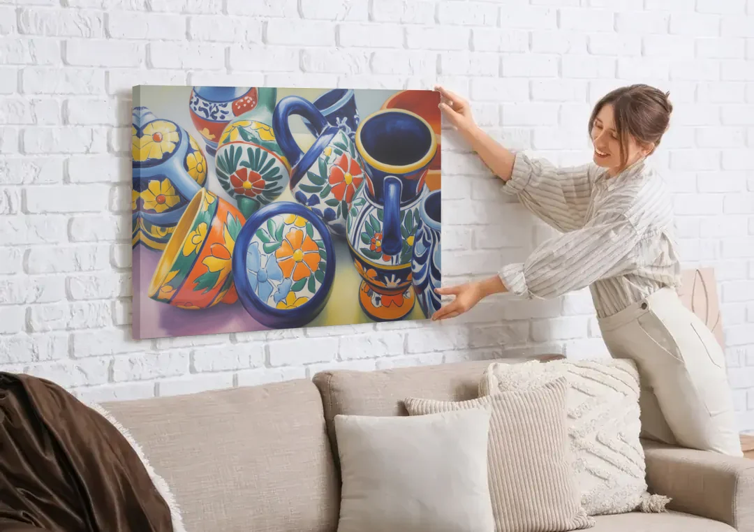 Talavera Pottery Colors canvas wall art being hung on a white brick wall above a sofa
