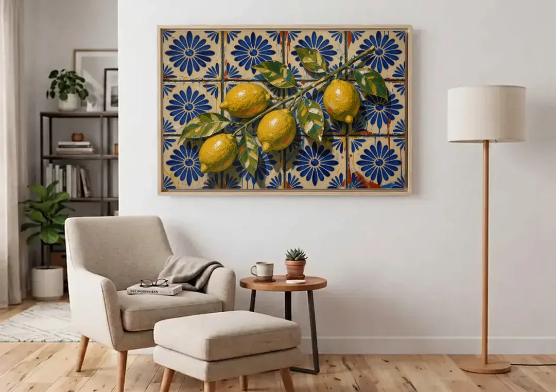 Talavera Wall Art with a Lemon Branch canvas wall art above an armchair in a bright living room