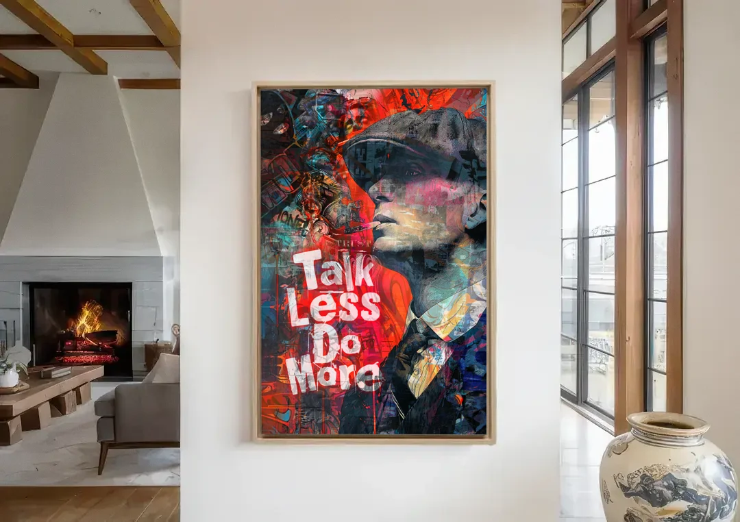 Talk Less Do More canvas wall art in a living room with a fireplace