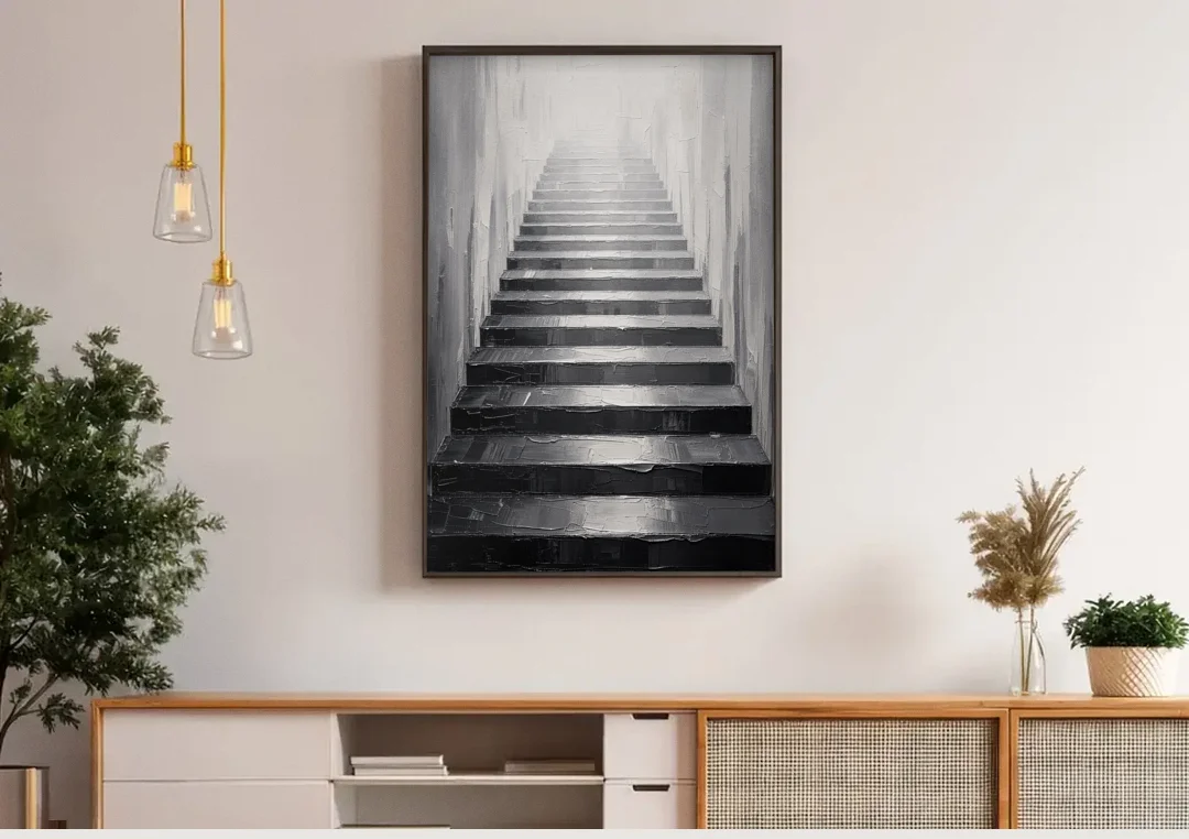 Tall Narrow Wall Art of Stairs Into White Light canvas wall art above a wooden sideboard under pendant lights