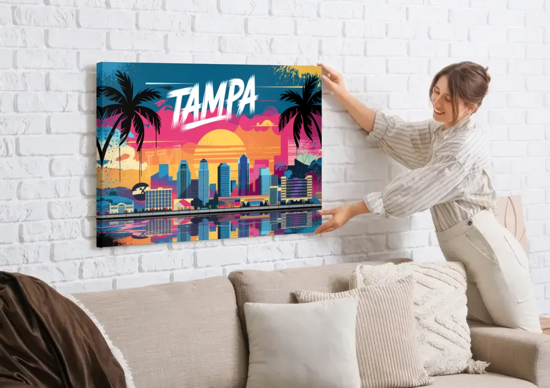 Tampa Urban Street Art Vibes canvas wall art being hung on a white brick wall above a sofa