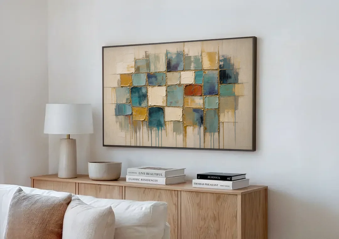 Teal and Cream Tile Grid with Gold Seams canvas wall art above a wooden sideboard next to a sofa