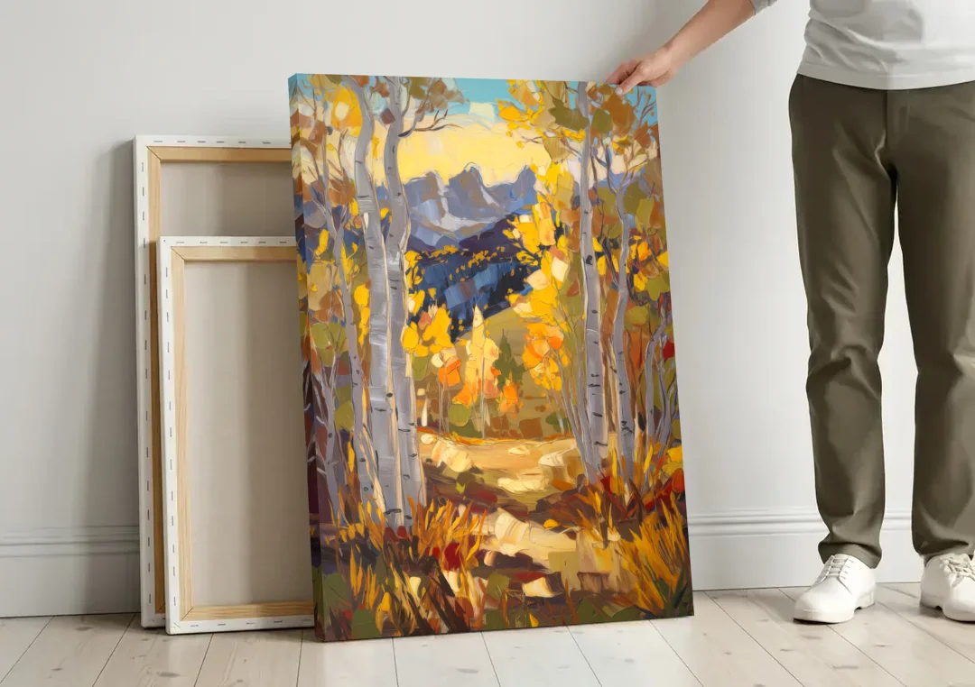 Telluride Autumn Aspen Forest canvas wall art leaning against a wall next to blank canvases