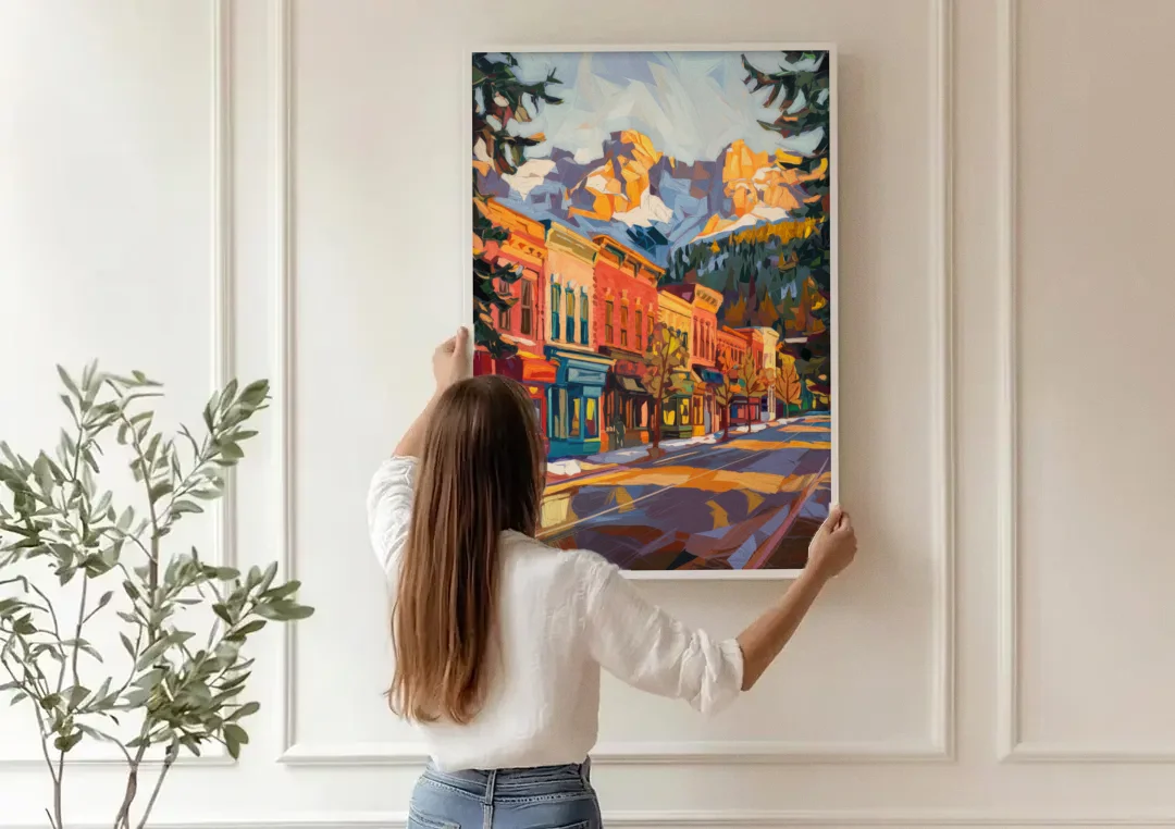 Telluride Downtown Charm canvas wall art being hung on a paneled wall