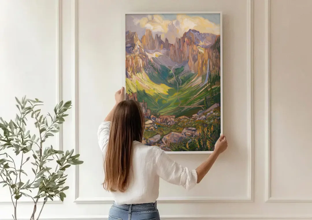 Telluride Rocky Mountain Peaks canvas wall art being hung on a paneled wall
