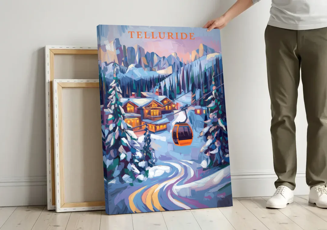 Telluride Winter Wonderland canvas wall art leaning against a wall next to blank canvases