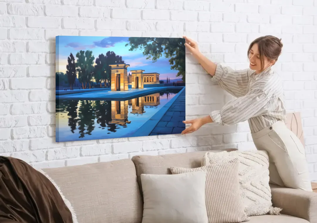 Temple of Debod Twilight canvas wall art being hung on a white brick wall above a sofa
